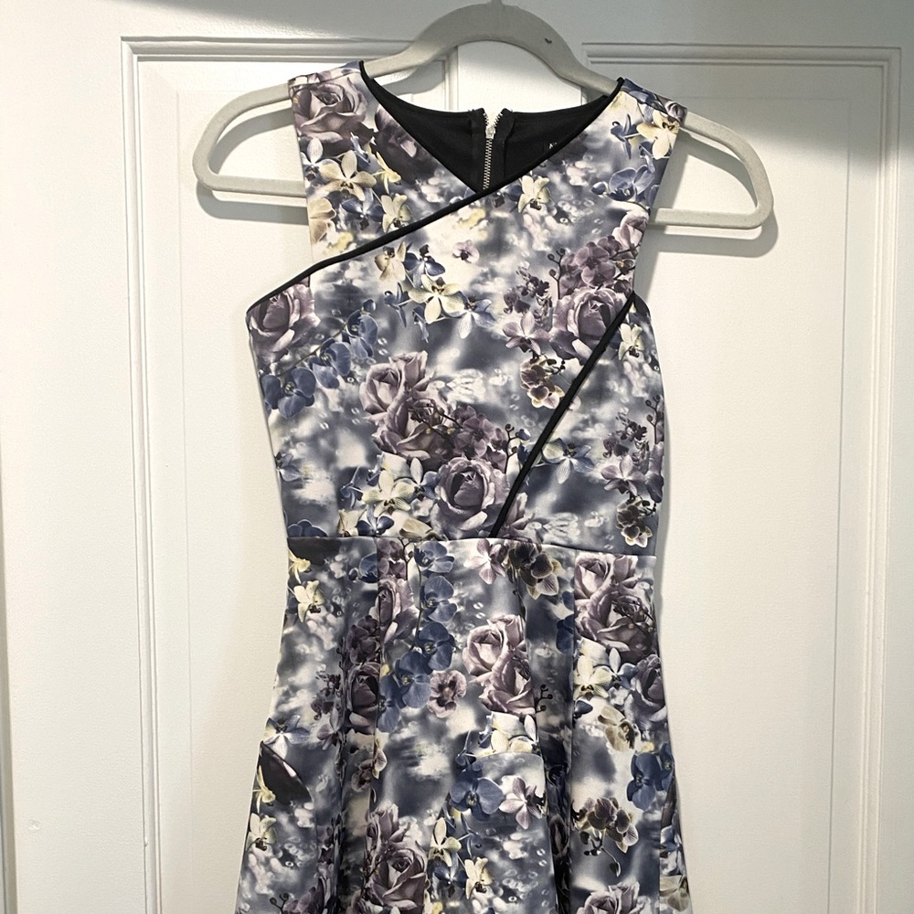 Miss Behave size L (juniors) Party dress in blue floral.